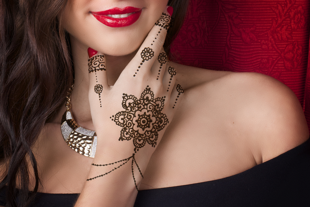 Woman with henna art on her hands