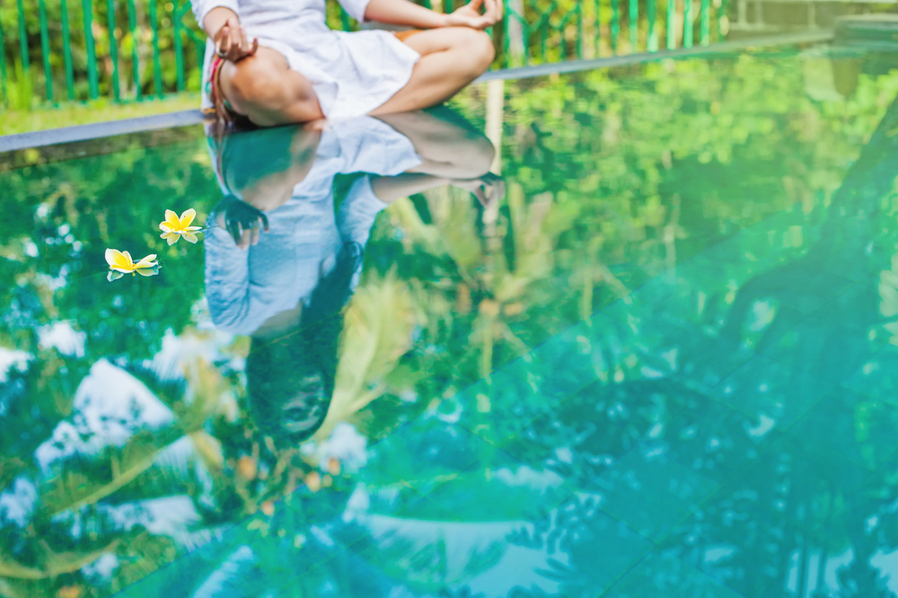 Woman meditating in a spa