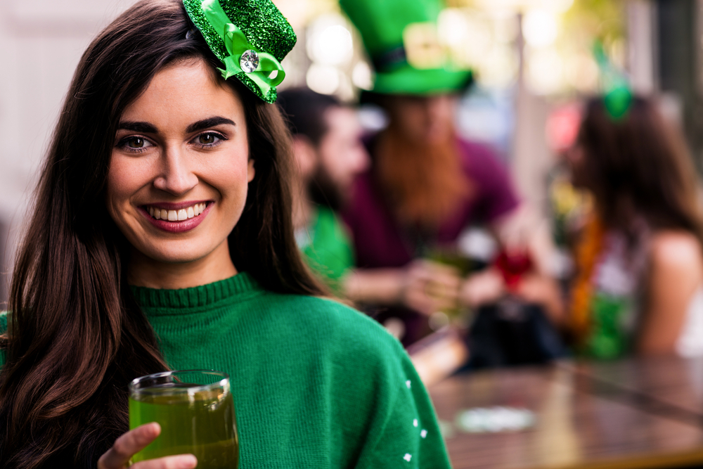 Woman having green beer