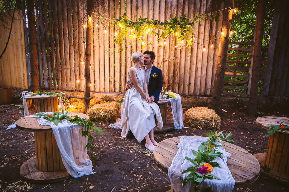 newlyweds in rustic setting